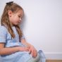 Sad,Depressed,Pensive,Little,Girl,Sitting,On,The,Floor,Stressed